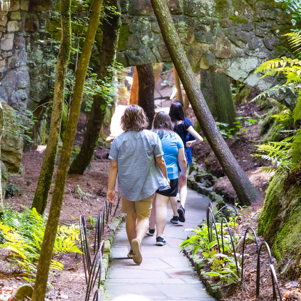 Exploring the Enchanted Trail at Rock City, one of the best kid-friendly hiking trails with views on Lookout Mountain.