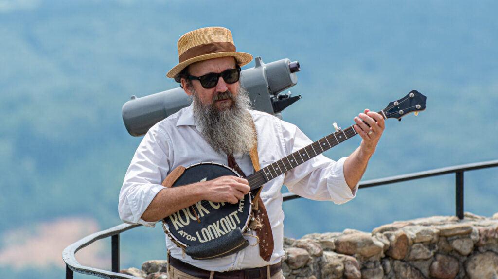 Matt Downer Keller playing banjo at Rock City.