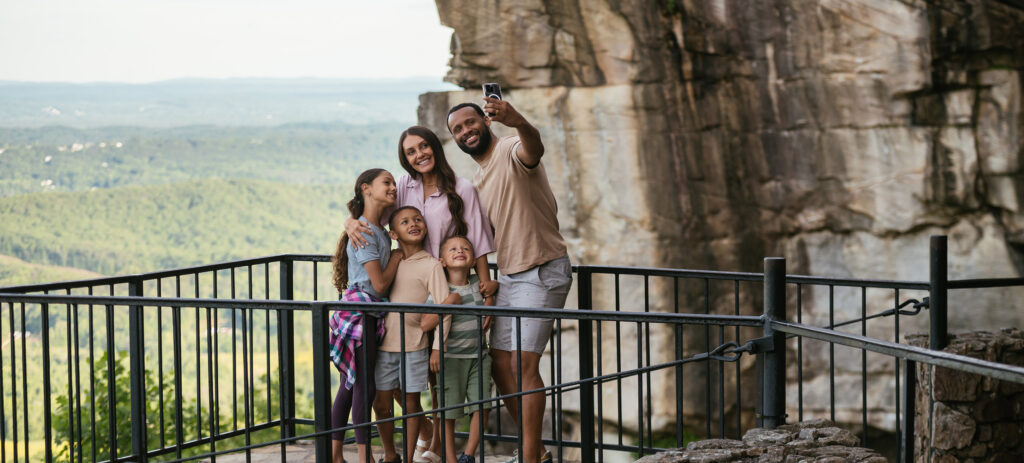 Family taking photo at Rock City.