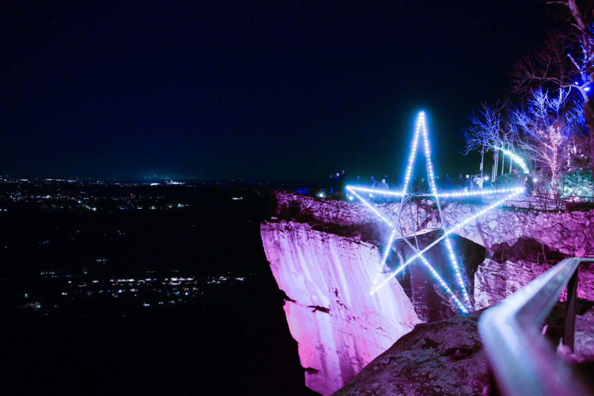Large lighted star on cliff at Rock City.
